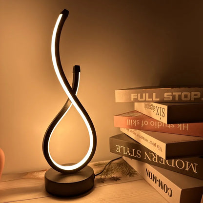 Ambiance Glow:  LED Table Lamp with Decorative Design