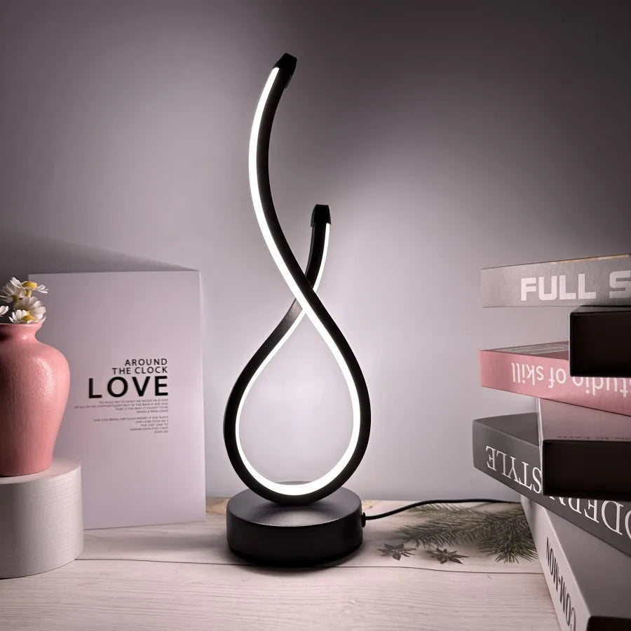 Ambiance Glow:  LED Table Lamp with Decorative Design