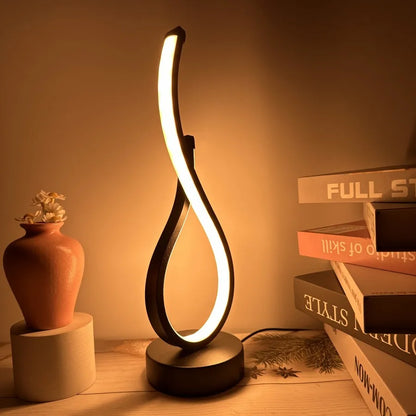 Ambiance Glow:  LED Table Lamp with Decorative Design