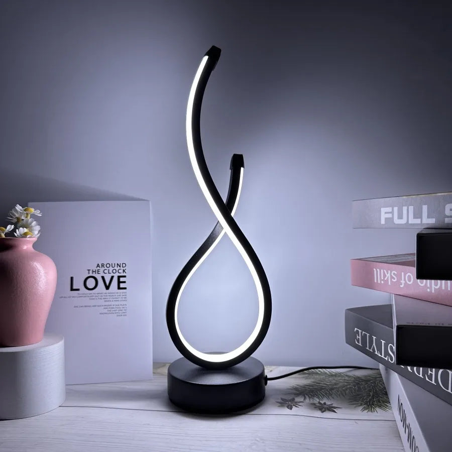 Ambiance Glow:  LED Table Lamp with Decorative Design