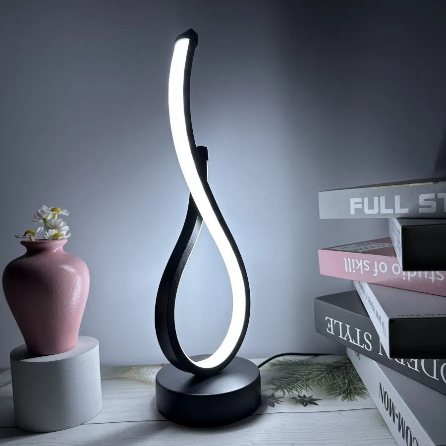 Ambiance Glow:  LED Table Lamp with Decorative Design